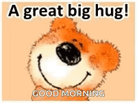 A Teddy Bear Is Smiling And Saying `` A Great Big Hug ! `` Good Morning . GIF