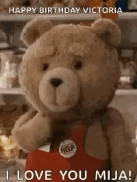 A Teddy Bear Is Wearing A Red Apron And Says `` Happy Birthday Victoria I Love You Mija ! '' GIF