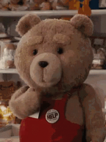 Teddy Bear In Red Apron With Help Button GIF
