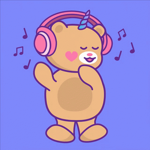 A Teddy Bear With A Unicorn Horn Wearing Headphones GIF