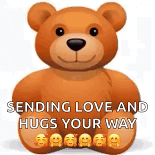 A Teddy Bear With Smiley Faces On Its Feet Is Sitting On A White Surface . GIF