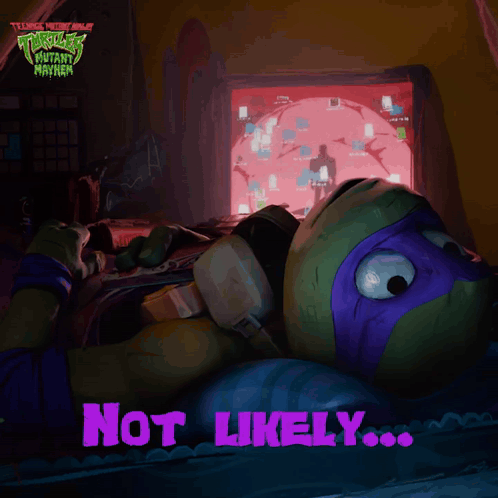 a teenage mutant ninja turtle laying in front of a computer screen
