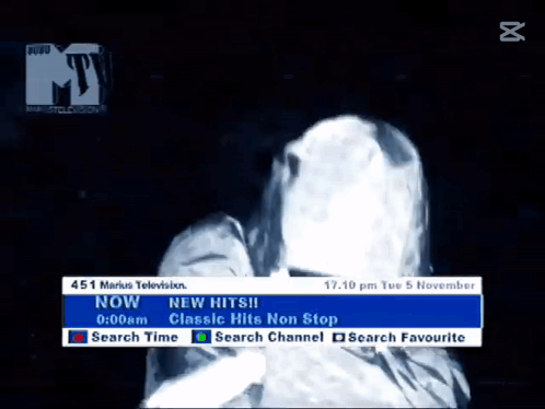 A Television Screen Shows A Ghostly Figure And Says New Hits GIF
