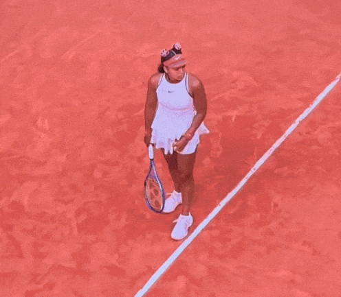 A Tennis Court With A Bnp Paribas Banner On The Wall GIF