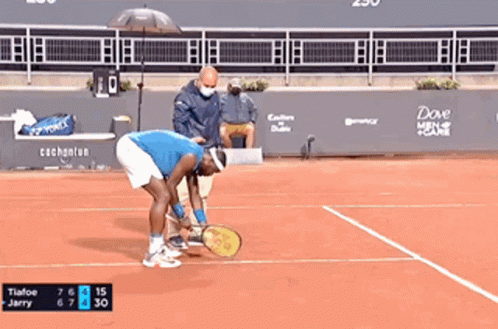 a tennis match between tiafoe and jerry