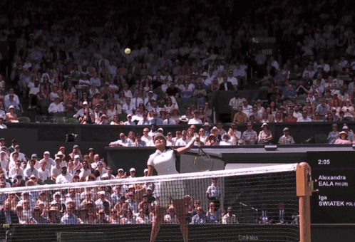 A Tennis Match Is Being Played Between Alexandra Eala And Na Swatek GIF