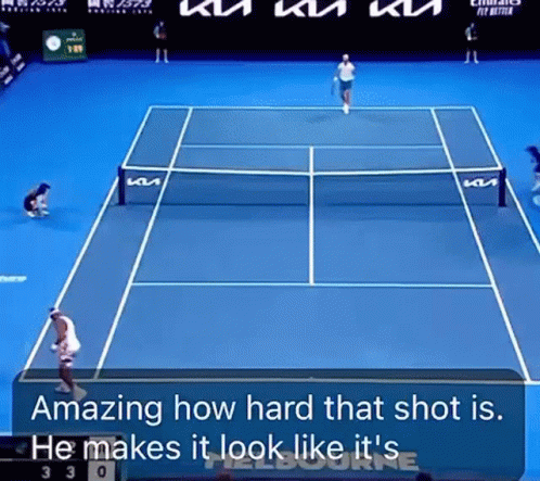 a tennis match is being played on a blue court and the words amazing how hard that shot is are on the screen