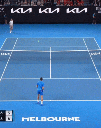 A Tennis Match Is Being Played On A Court That Says Melbourne On It GIF