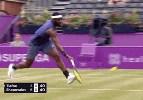 a tennis player named tiafoo shapovalov is swinging his racket