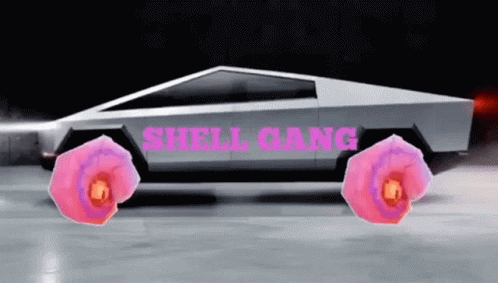 A Tesla Cybertruck With Pink Flowers On The Wheels Is Driving Down A Road . GIF