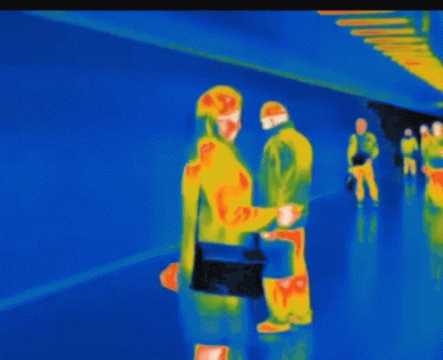 A Thermal Image Of A Man And A Woman GIF