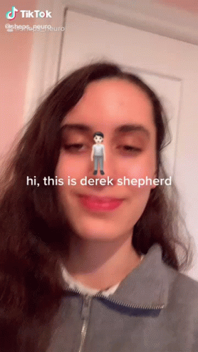 A Tiktok Video Of A Girl With A Man On Her Nose Says Hi This Is Derek Shepherd GIF