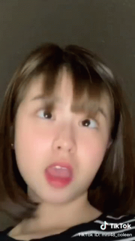 A Tiktok Video Of A Girl With Her Mouth Open GIF