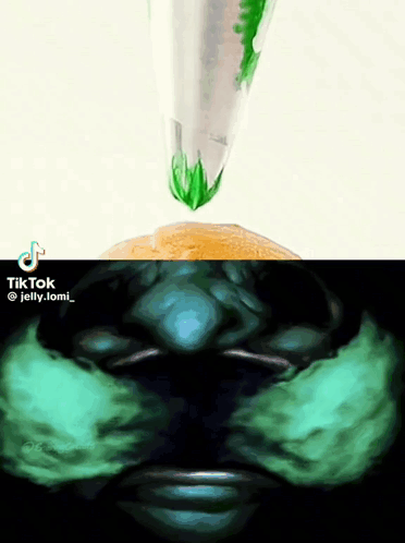 A Tiktok Video Of A Person 'S Face With Jelly Coming Out Of A Cone GIF