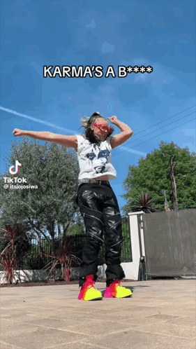 A Tiktok Video Of A Woman Dancing With The Caption Karma 'S A B GIF