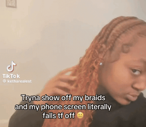 A Tiktok Video Of A Woman With Braids And A Phone Screen GIF