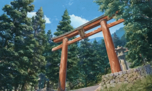 A Torii Gate In The Middle Of A Forest With A Blue Sky GIF