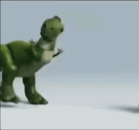 A Toy Dinosaur From The Movie Toy Story Is Walking On A White Surface . GIF