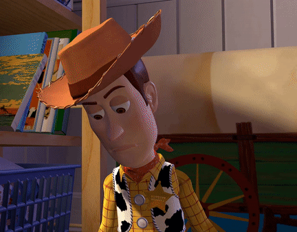 A Toy Story Character Wearing A Cowboy Hat And A Plaid Shirt GIF