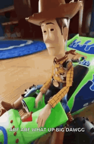 A Toy Story Woody Doll Is Sitting In A Toy Car With The Caption `` Arf Arf What Up Big Dawgg '' . GIF