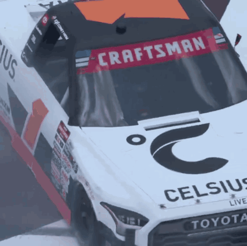 A Toyota Race Car With A Craftsman Banner On It GIF