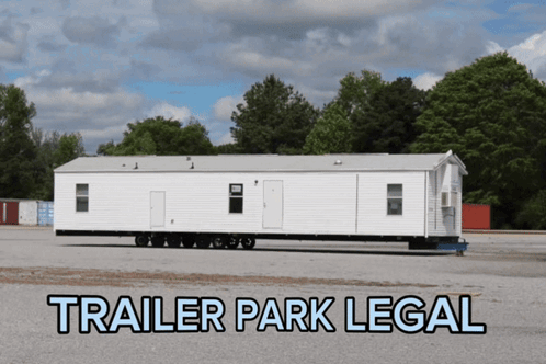 A Trailer Park Legal Sign With A Mobile Home GIF