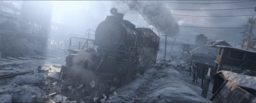 A Train Is Going Through A Snowy Landscape With A Sign That Says ' A ' On It GIF