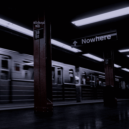 A Train Is Going To Nowhere At A Subway Station GIF
