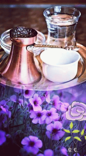A Tray With Purple Flowers And A Glass Of Water GIF