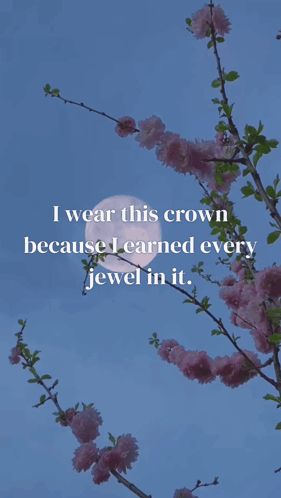 A Tree With Pink Flowers And A Quote That Says I Wear This Crown Because I Earned Every Jewel In It GIF