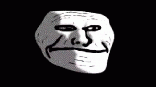 A Troll Face With A Smile On It 'S Face On A Black Background GIF