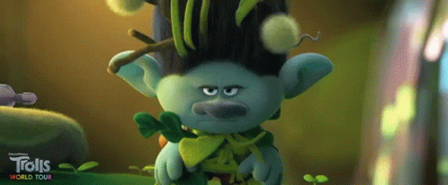 A Troll From Trolls World Tour Is Holding A Plant In His Hands GIF