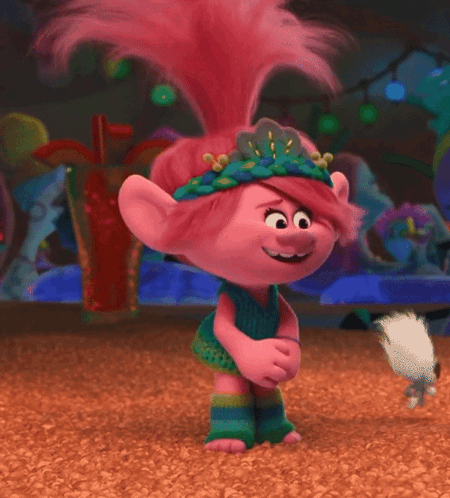 A Troll With Pink Hair And A Flower Crown On GIF
