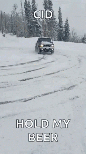 A Truck Is Parked In The Snow With A Caption That Says " Hold My Beer " GIF