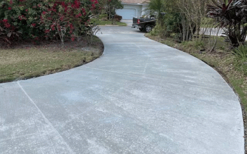 A Truck Is Parked On The Side Of A Curved Driveway GIF