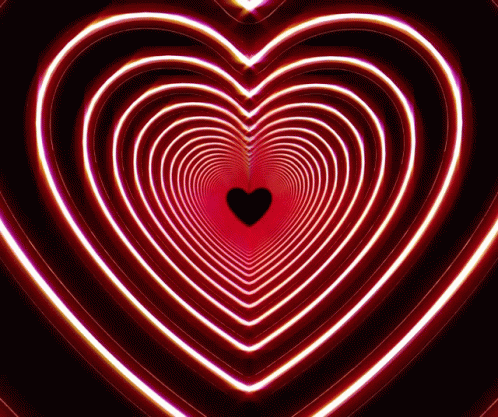 A Tunnel In The Shape Of A Heart With A Black Heart In The Middle GIF