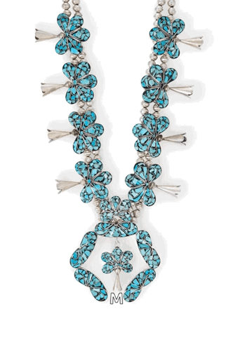 A Turquoise And Silver Circle With The Letter M Underneath It GIF