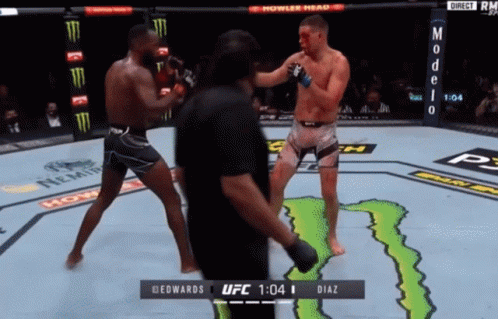 A Ufc Fight Between Edwards And Diaz Is Shown On A Screen GIF