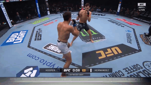 A Ufc Fight Between Hooper And Hernandez Is On Espn GIF