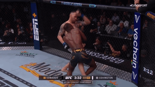 A Ufc Match Between Edwards And Covington Is Shown On Eurosport GIF