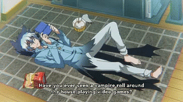 A Vampire Laying On The Floor With The Words Have You Ever Seen A Vampire Roll Around The House Playing Video Games Writ GIF