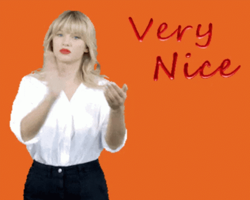 A Very Nice I Like It Sign With A Woman Clapping GIF