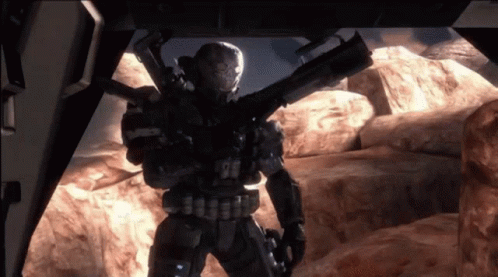 A Video Game Character Holding A Rocket Launcher In A Tunnel GIF