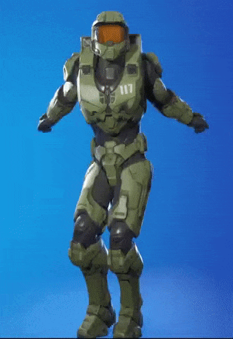 A Video Game Character In A Green Armor Is Standing On A Blue Surface . GIF
