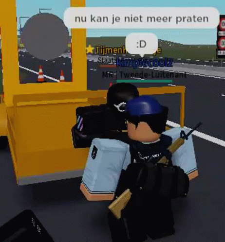 a video game character is holding a gun in front of a yellow booth .