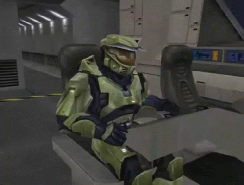 A Video Game Character Is Sitting In A Chair With A Display That Says ' 00 ' GIF