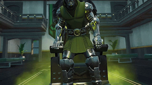 A Video Game Character Is Sitting In A Chair With His Hands Folded In Front Of His Face GIF