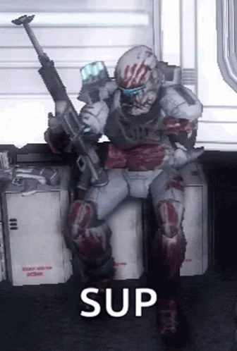 A Video Game Character Is Sitting On A Box Holding A Gun And The Word Sup Is Above Him . GIF