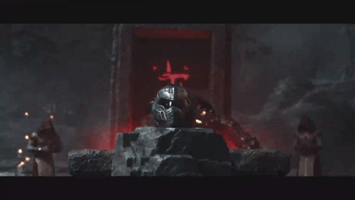 A Video Game Character Is Sitting On A Throne With A Helmet That Says ' Doom ' On It GIF