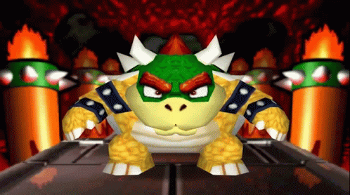 a video game character named bowser is standing in front of a fire